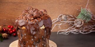 Delicious chocolate panettone topped with Kinder Bueno, perfect for festive celebrations.