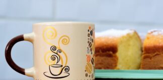 A cozy coffee break scene with mug and cake, perfect for food lovers.