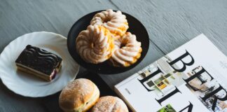 A selection of German sweets and pastries with a Berlin magazine, perfect for a cozy breakfast.
