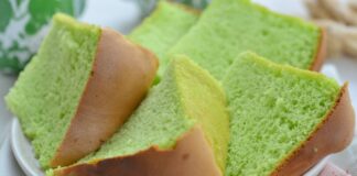 Delectable slices of green pandan chiffon cake on a white plate. Perfect for dessert lovers.