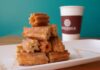 A tempting stack of cinnamon sugar churros with coffee in Azusa, California.
