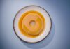 A delicious Brazilian flan on a white plate, perfect for food photography and culinary websites.